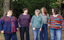 Load image into Gallery viewer, A photo of 5 people wearing sweaters
Karen: plus size white woman with long brown hair wears Flutterby, a yoke cardigan - yellow, orange and pink rectangles on a dark blue background
Stregger: plus size queer non-binary person wears Accentual, a dark plum yoke pullover with coloured accents 
Marit: a queer white woman with a unilateral mastectomy wears Lisqud. A teal cardigan with a cable decal
Jenn: a white woman with long curly hair wears a pale green v-neck pullover
Beth wears Cafe Society